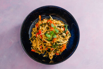 plant-based food, vegan stir fry with bean sprouts and vermicelli noodles