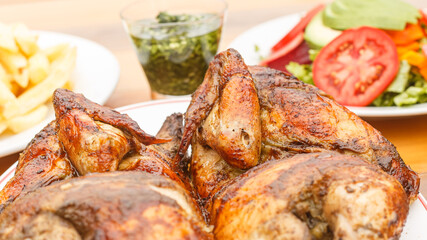grilled chicken with salad and french fries - peruvian food