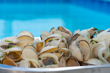 Delicious Lambreta (kind of clam), cooked with onions and cilantro