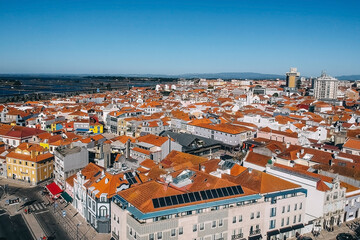 Fototapeta na wymiar .Top view of the city, narrow streets and roofs of houses with red tiles Cascais.