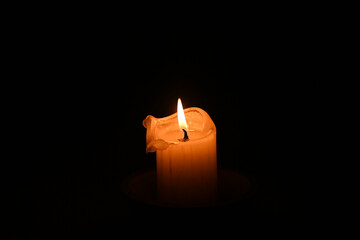 light a candle in the dark