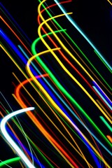 Abstract colorful background with minimalist light traces produced by slow shutter speed