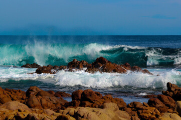 Scenic landscape at popular snorkeling, sliding down massive sand dunes, swimming and diving...