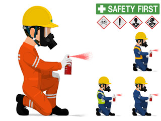 An industrial worker with respirator is spraying color