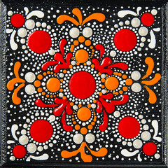 Mandala dot art painting on wood tiles. Beautiful mandala hand painted by colorful dots on black...