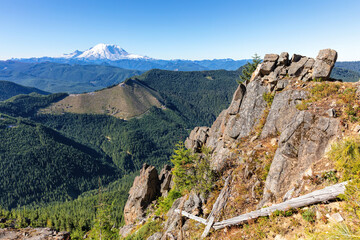 Rock face with view of Mt Rainier