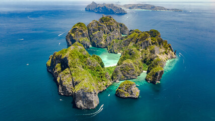 Aerial drone view of tropical Ko Phi Phi island, beaches and boats in blue clear Andaman sea water...