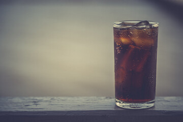 Cola with ice in the glass ready to drink for refresh