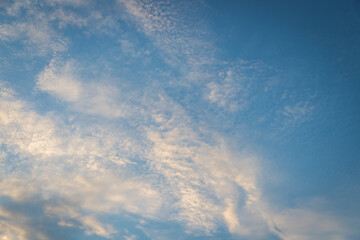 Bright sky with fluffy white clouds