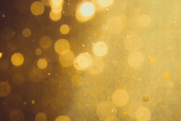 Dark Abstract Gold bokeh sparkle on black