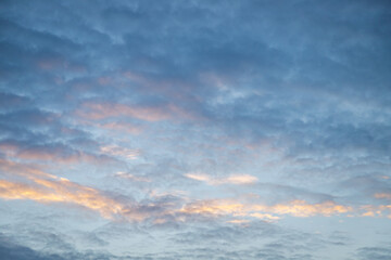 Bright sky with fluffy white clouds natural background