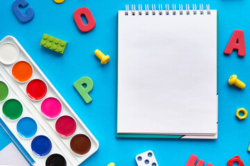 School supplies, stationery on blue background space for caption. Back to school concept. School,...