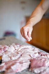 the process of cooking meat with vegetables wrapped in foil, on the grill at home, with your own hands, on an autumn day
