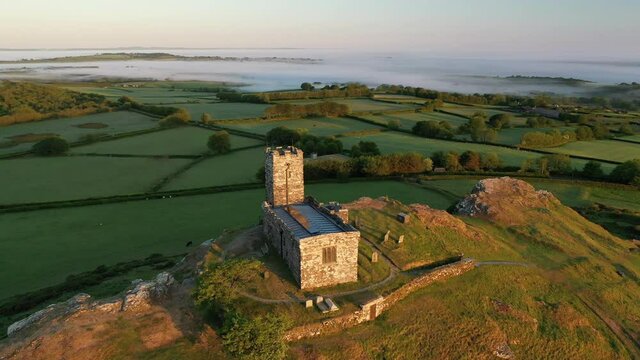 Aerial clip of Brentor Church in Dartmoor National Park, Devon, England