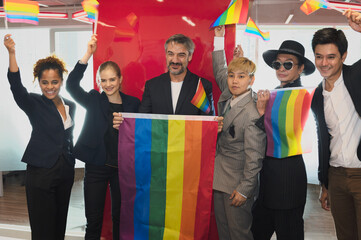Group of business people with diverse genders (LGBT) celebrate LGBT freedom and support with LGBT...