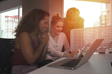 Group of business people with diverse genders (LGBT) discuss business in the meeting room at office...