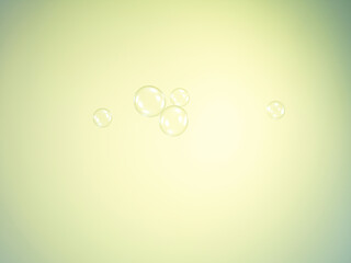 Soap bubbles on yellow background