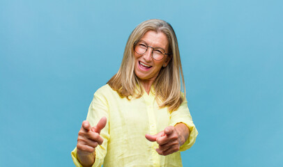 middle age pretty woman looking serious, confused, uncertain and thoughtful, doubting among options...