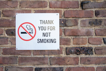 Fototapeta na wymiar Thank you for not smoking text sign with a no smoking icon graphic