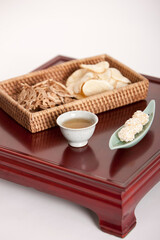 korean food, cookie and tea on table