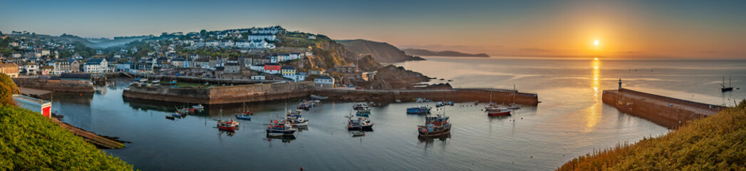 Panoramic view of the harbour at Mevagissey in Cornwall at sunrise