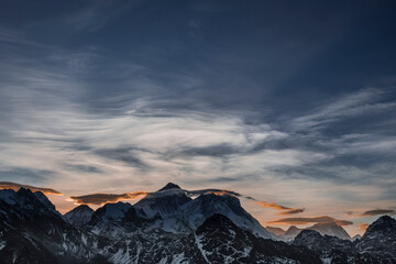 Picturesque colourful clouds over Mount Everest at sunrise. No people.