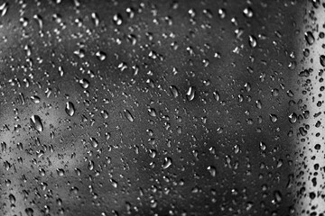 Rain texture drops on glass black background