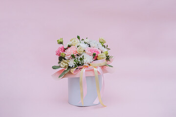 Bouquet of flowers: roses, eucalyptus, daisies, peonies in a round box hat. Composition gift vase of flowers for Valentine's day, mother's day, wedding, birthday.