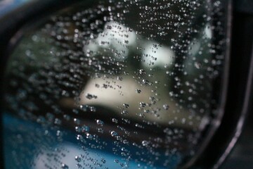 Rain drops on a gray background.