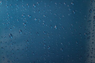 Rain texture drops on blue background