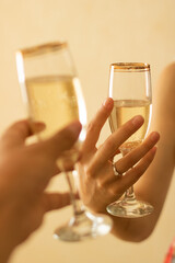 Loving couple with spampans in hands