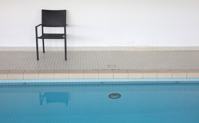Chair in swimming pool
