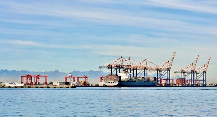 Fototapeta na wymiar Landscape with the Cape Town container harbor 