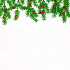 Obraz na płótnie Canvas Christmas decorations on white wooden background with blank space for text