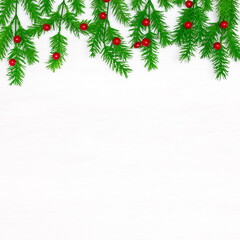Christmas decorations on white wooden background with blank space for text