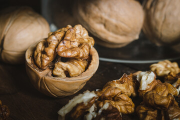 Walnuts on the table with bank closeup