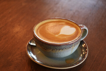 Closeup cup of coffee on the table