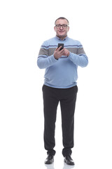 in full growth. attractive mature man with smartphone