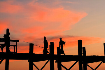 Fototapeta na wymiar U Bein bridge, Myanmar with sunset