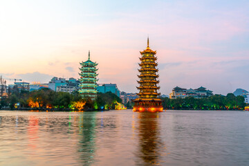 Night view of sun and Moon Twin Towers in Guilin, Guangxi Province, China
