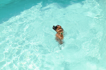 Boy In Swimming Pool. Summer Entertainment For Fun In Turquoise Water At Resort. Happy Wet Kid Enjoying Leisure On Vacation. Summer Activity As Lifestyle.