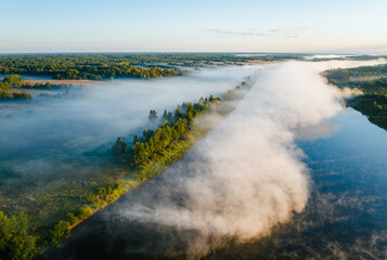 Early morning landscape. Foggy river. River valley in the morning fog at sunrise. View from above. River Volkhov, Russia