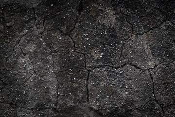 Rough surfaces on the ground with mortar cracks.