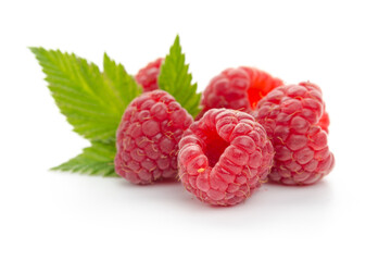  raspberries with leaf isolated on a white background