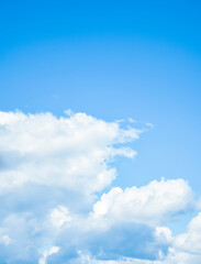 light blue sky with clouds
