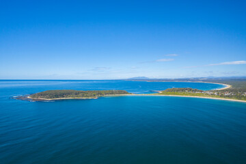 Panoramic aerial view of Broulee Island at Broulee near Batemans Bay on the New South Wales South Coast, Australia 