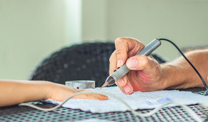 Vegetative rezonans diagnostic. Doctor examines child boy hand with the help of bioresonance...
