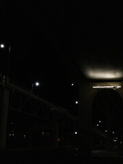 under the bridge at night