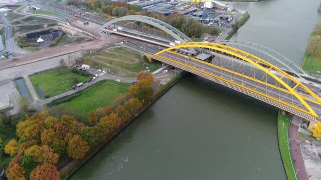 Aerial view of bridge construction work where the object was driven to its final berth and placed across Amsterdam-Rhine Canal with the help of pontoons and 600 wheels very ambitious Dutch project 4k