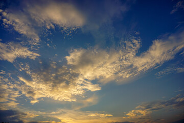 Naklejka na ściany i meble Sunset sky yellow clouds, perfect for background 